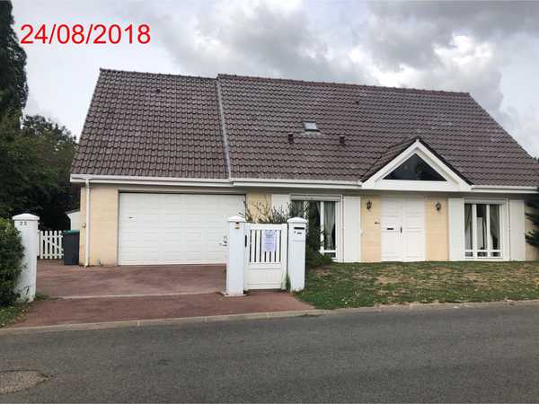 UNE  MAISON D'HABITATION
