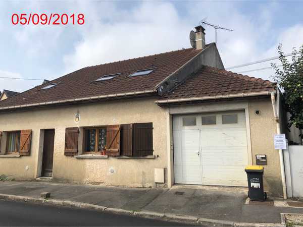 UNE MAISON D'HABITATION