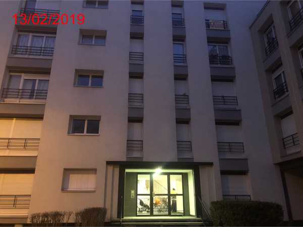 UN APPARTEMENT ET UNE PLACE DE GARAGE