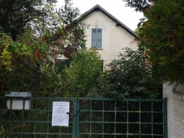 UNE  MAISON D'HABITATION ET UN APPARTEMENT