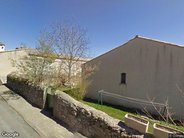 UNE MAISON À USAGE D'HABITATION