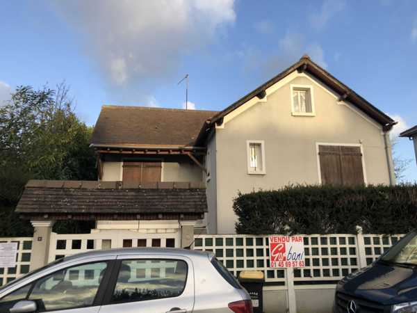 UNE MAISON D'HABITATION