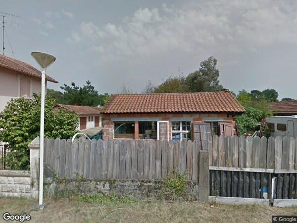 UNE MAISON À USAGE D'HABITATION