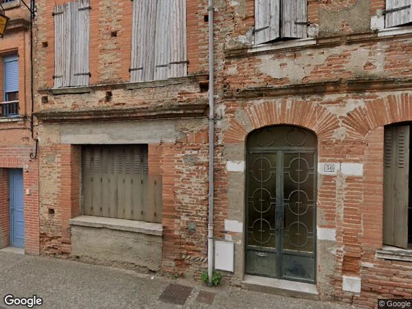 UNE  MAISON DE VILLAGE A USAGE MIXTE D'HABITATION ET COMMERCIAL