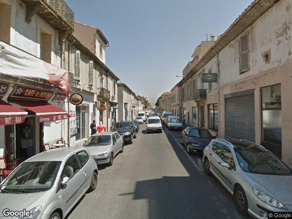UN  APPARTEMENT A USAGE D'HABITATION AVEC BALCON ET GRENIER