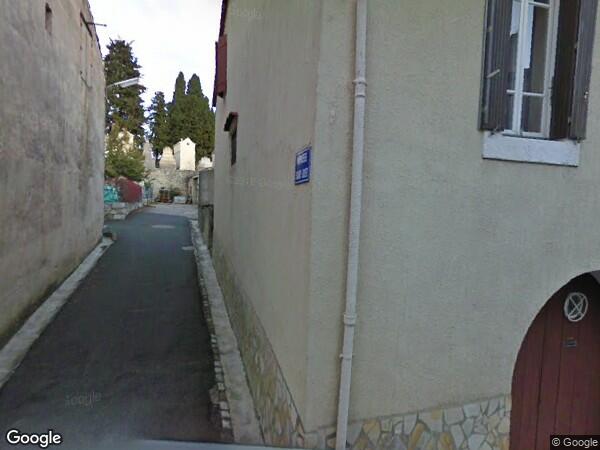 UNE  MAISON D'HABITATION ET DIVERS LOTS