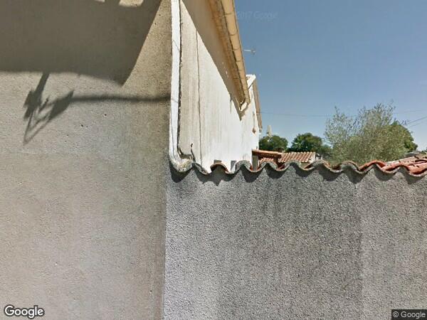 UN  IMMEUBLE A USAGE D'HABITATION