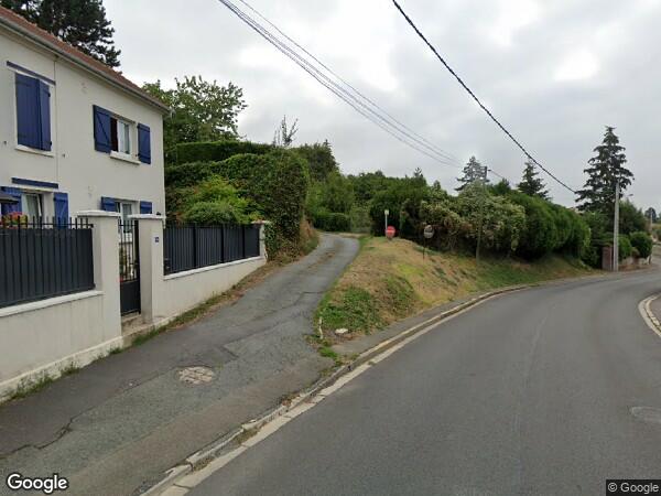 UN  APPARTEMENT + AIRE DE STATIONNEMENT