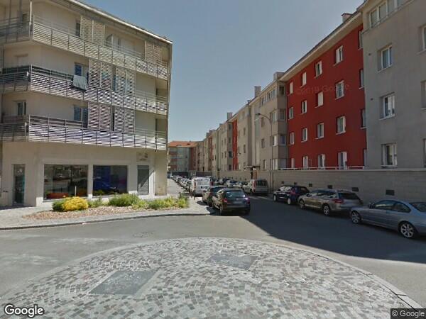 UN APPARTEMENT ET UNE PLACE DE PARKING