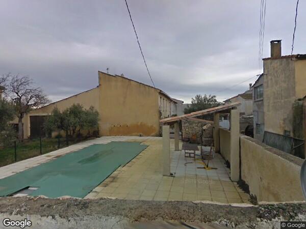 UNE  MAISON D'HABITATION DE TYPE 4