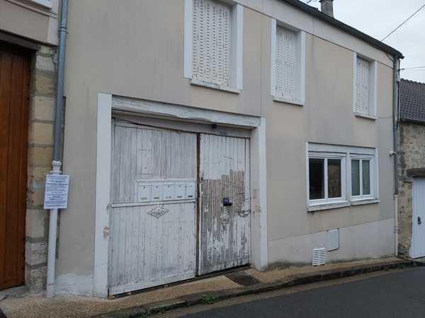 UN ENSEMBLE IMMOBILIER COMPRENANT 4 LOGEMENTS