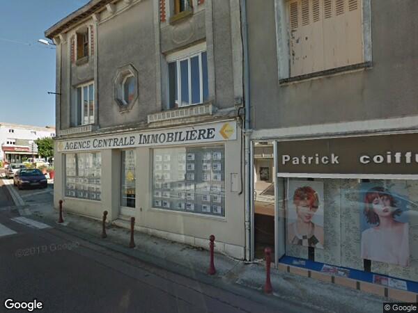 UN  IMMEUBLE A USAGE COMMERCIAL ET D'HABITATION