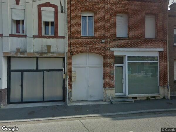 UN  IMMEUBLE A USAGE COMMERCIAL ET HABITATION