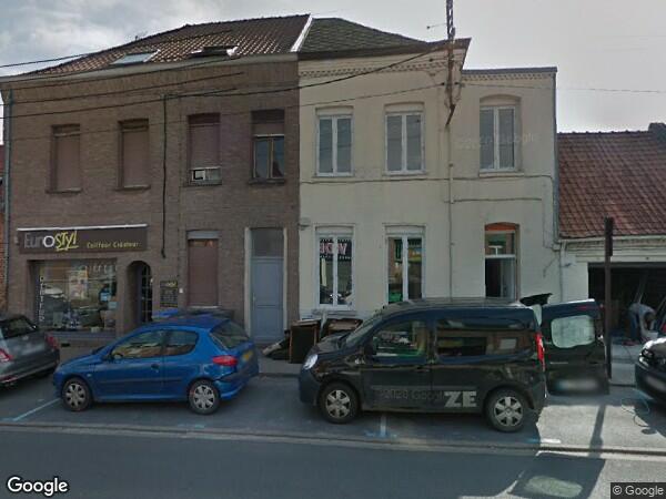 UN  LOCAL À USAGE MIXTE D'HABITATION ET COMMERCIAL 