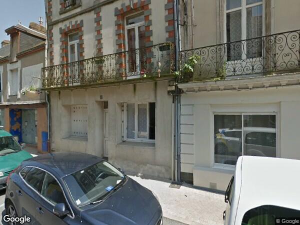 UN  ENSEMBLE IMMOBILIER, PARCELLE DE TERRAIN