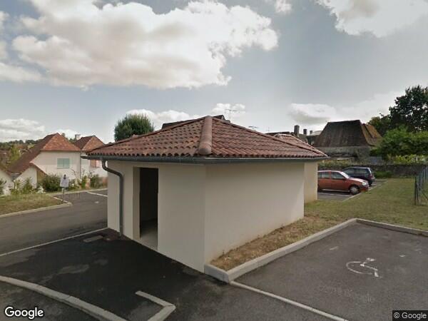 UN  APPARTEMENT DE TYPE 2 ET PLACE DE STATIONNEMENT EXTÉRIEUR