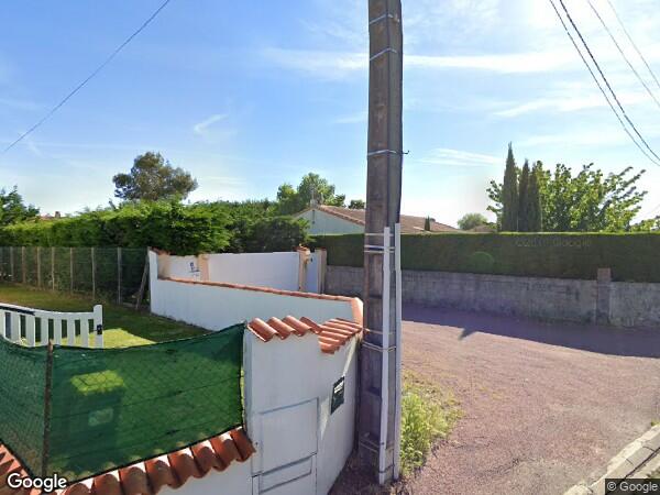 UNE  MAISON D'HABITATION