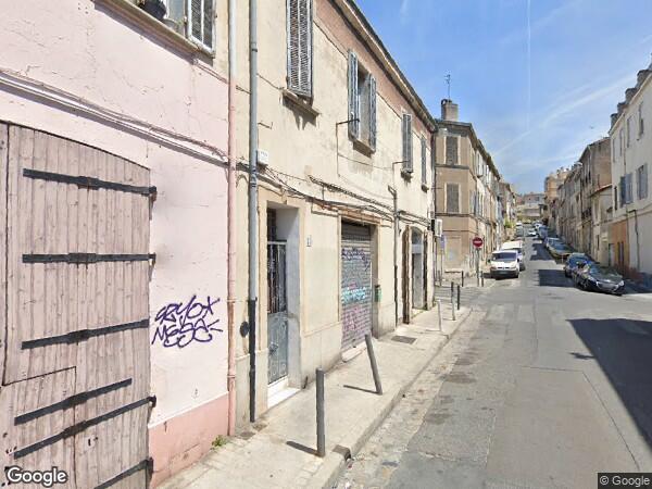 UN LOCAL A USAGE D’ENTREPÔT OU DE GARAGE 