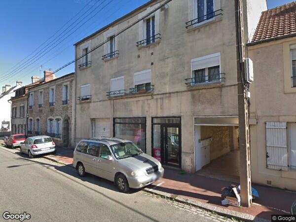 UN IMMEUIBLE À USAGE D'HABITATION