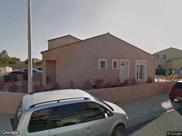 UNE MAISON À USAGE D'HABITATION