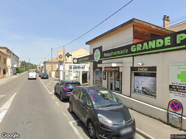 UNE  PROPRIÉTÉ BÂTIE À USAGE D'HABITATION AVEC JARDIN