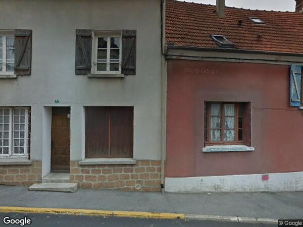 UN PAVILLON À USAGE D'HABITATION ET GARAGE ATTENANT