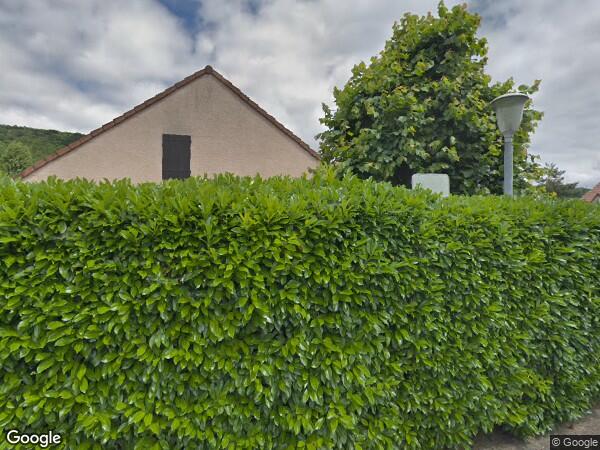 UN  PAVILLON À USAGE D'HABITATION