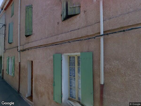 UN IMMEUBLE À USAGE D'HABITATION