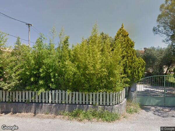 UNE  MAISON D'HABITATION AVEC TERRAIN ATTENANT