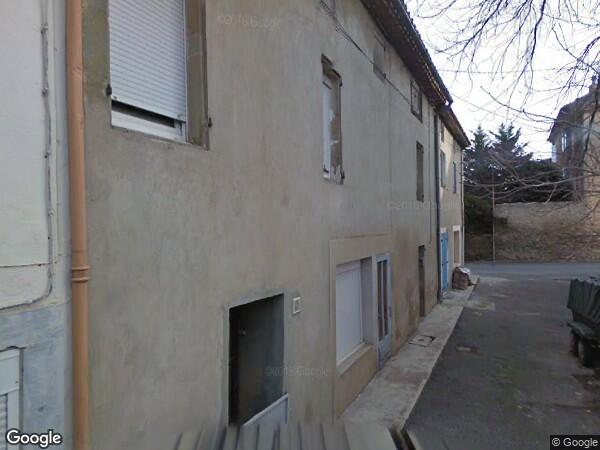 UNE MAISON À USAGE D'HABITATION