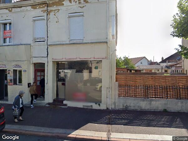 UN IMMEUBLE À USAGE MIXTE COMMERCIAL, PROFESSIONNEL ET D’HABITATION