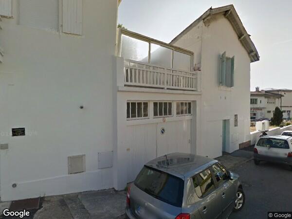 UN APPARTEMENT ET UN LOCAL COMMERCIAL