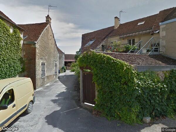 UN BATIMENT A USAGE D'HABITATION