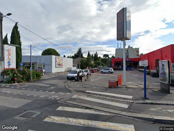 UN APPARTEMENT ET UNE PLACE DE STATIONNEMENT