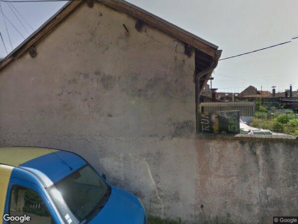 UNE MAISON D'HABITATION AVEC GARAGE ET TERRAIN ATTENANT