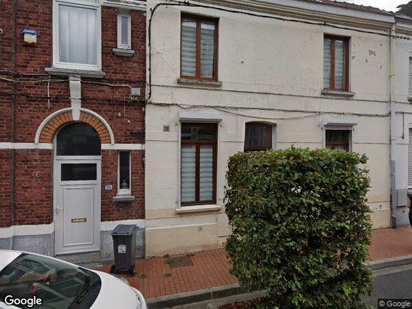 UN IMMEUBLE À USAGE D'HABITATION ET UN LOCAL ANNEXE À USAGE DE BUREAUX