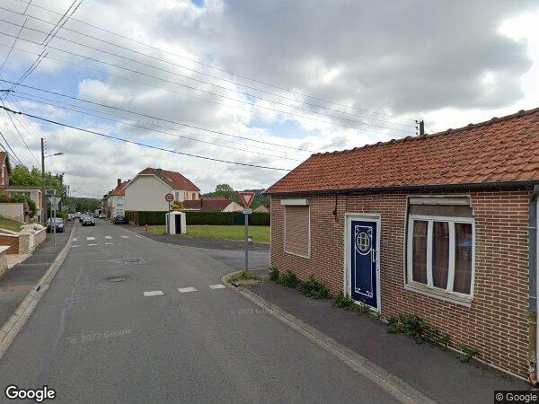 UNE MAISON D'HABITATION ET UN TERRAIN EN DÉPENDANT
