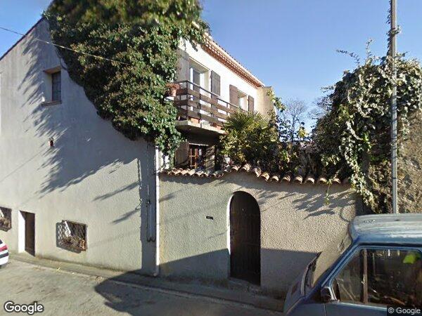 UNE MAISON D'HABITATION