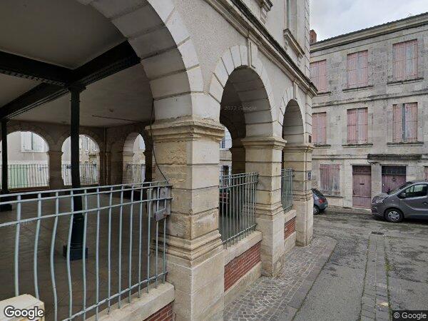 UNE MAISON À USAGE MIXTE