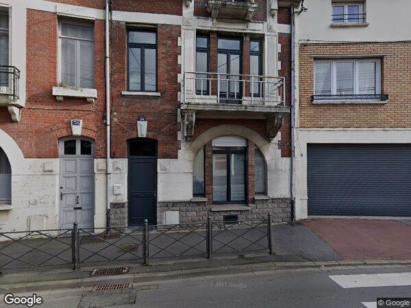 UN IMMEUBLE À USAGE D’HABITATION