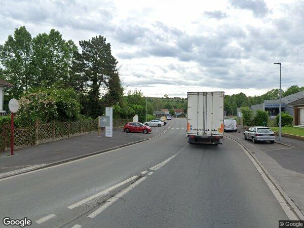 UN IMMEUBLE A USAGE DE COMMERCE ET D’HABITATION