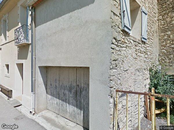 UNE MAISON À USAGE D'HABITATION