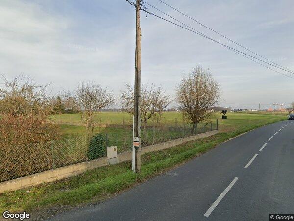 UNE MAISON D’HABITATION AVEC CAVE ET TERRAIN