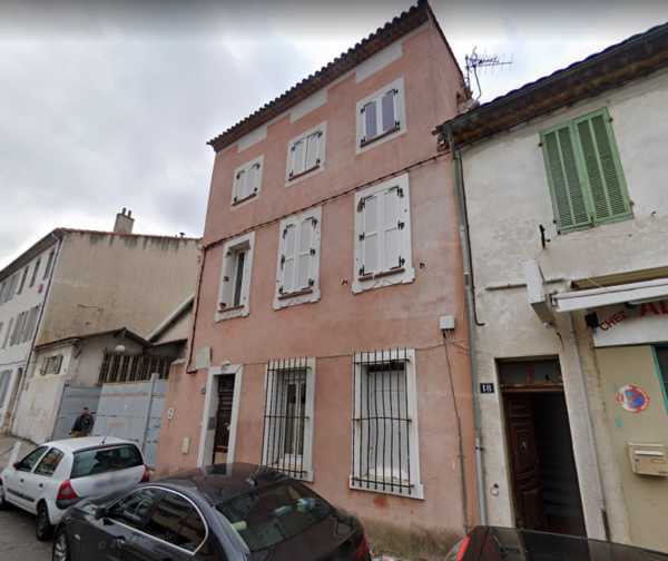 UN IMMEUBLE ENTIER ET DEUX BOX