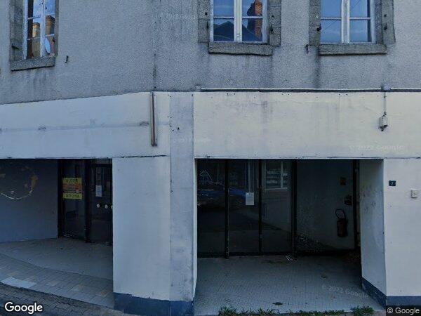 UN IMMEUBLE À USAGE COMMERCIAL ET D’HABITATION