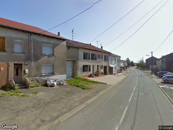 UNE MAISON À USAGE D'HABITATION