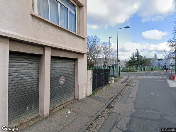 UN APPARTEMENT DE TYPE F3 AVEC UNE CAVE ET UN BOX A USAGE DE GARAGE
