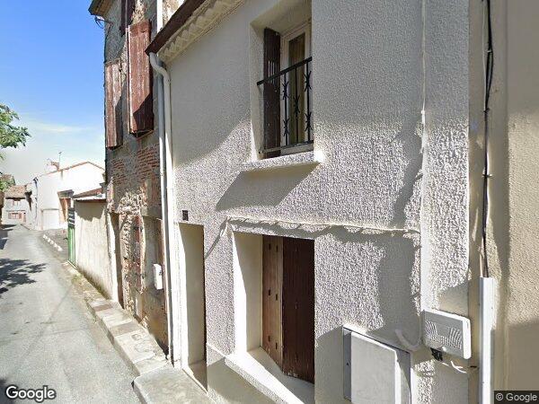 UNE MAISON À USAGE D'HABITATION