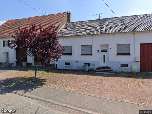 UNE MAISON À USAGE D'HABITATION