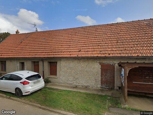 UNE MAISON D’HABITATION AVEC TERRAIN